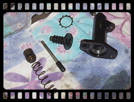 Disassembled clutch slave cylinder