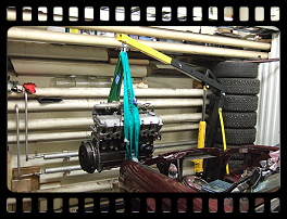 Engine hoisted back into place
