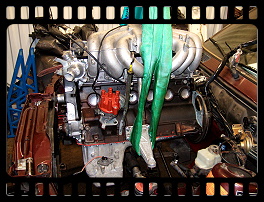 Engine hoisted back into place